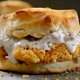 A fried chicken sandwich on a biscuit